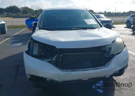 2014 Honda Cr-V Lx z USA, uszkodzony, nr VIN 5J6RM3H32EL012968